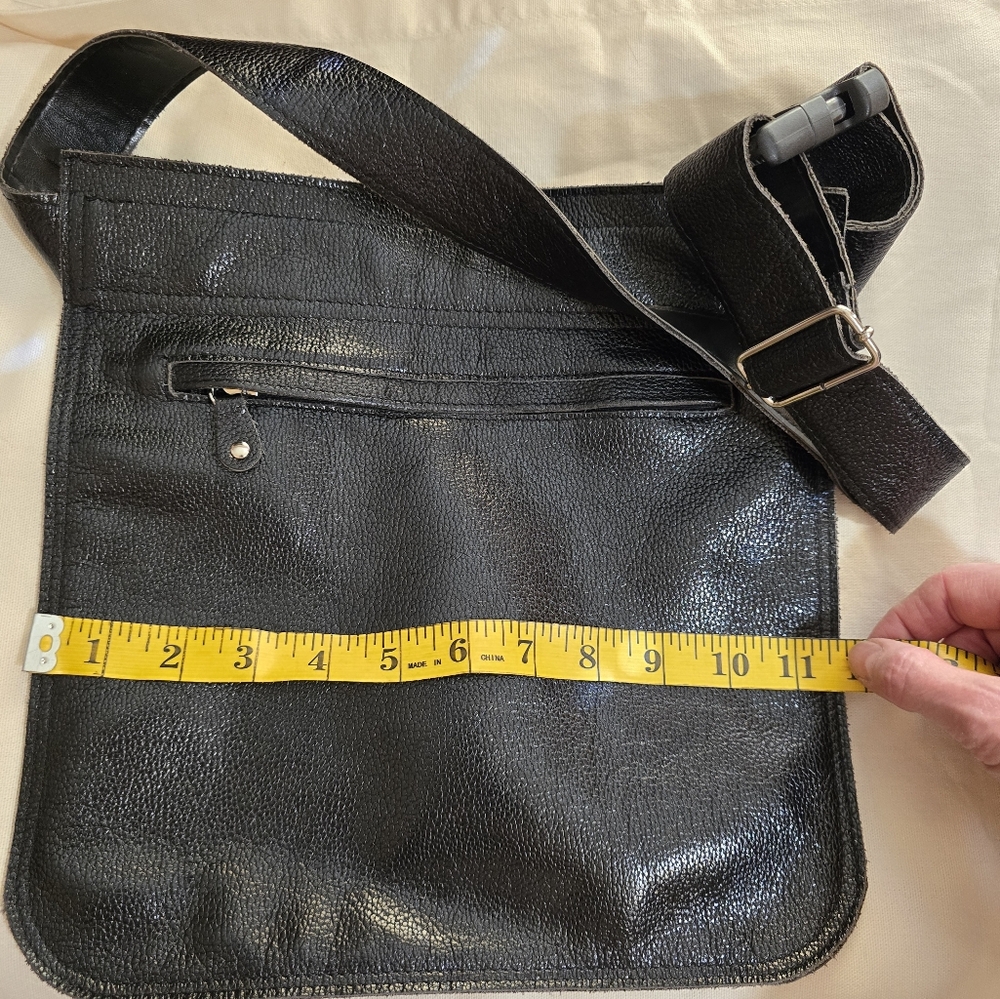 Leather utility pouch with belt and zip closure